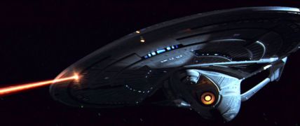 A Sovereign Class firing phasers.